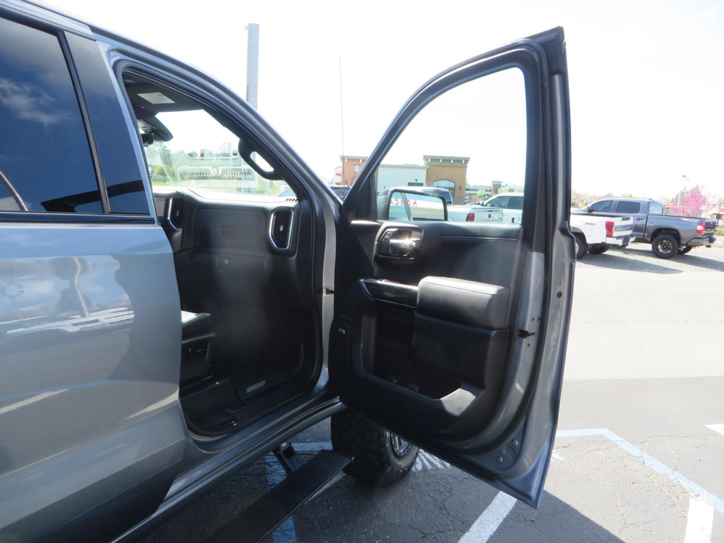 2019 CHARCOAL /BLACK GMC Sierra 1500 AT4 Crew Cab Long Box 4WD (1GTP9EEL6KZ) with an 6.2L V8 OHV 16V engine, 6A transmission, located at 2630 Grass Valley Highway, Auburn, CA, 95603, (530) 508-5100, 38.937893, -121.095482 - Dont miss this AT4 featuring a 4" RC lift kit kit, 35" Nitto Ridge Grappler tires, 20" Fuel Rebel wheels, Amp POwer steps, Air Bags, and a Tyger Bed cover. - Photo#44